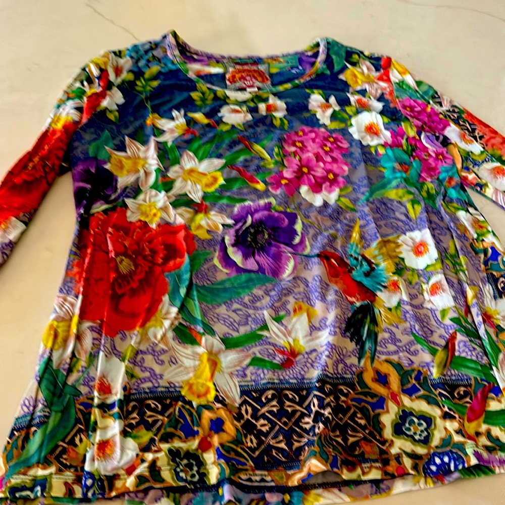 Bright colors, flowered, EUC. A little longer type top, round neck.